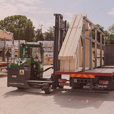 side view of attic roof trusses loaded onto trailer