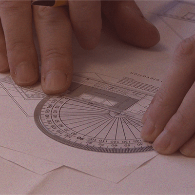 designer checking angle of roof truss
